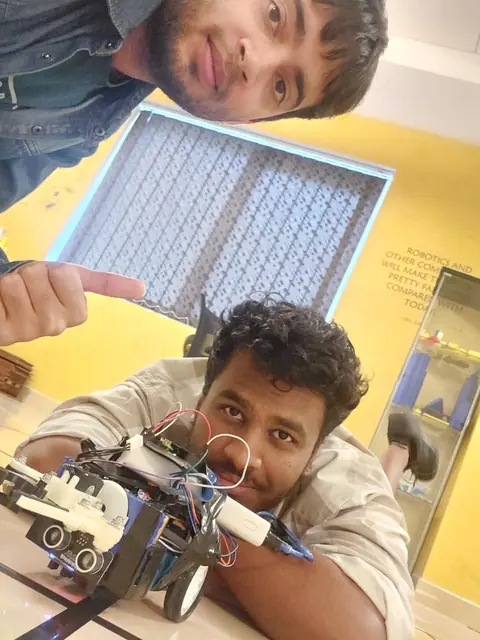 Adarsh Baburaj in the robotics lab