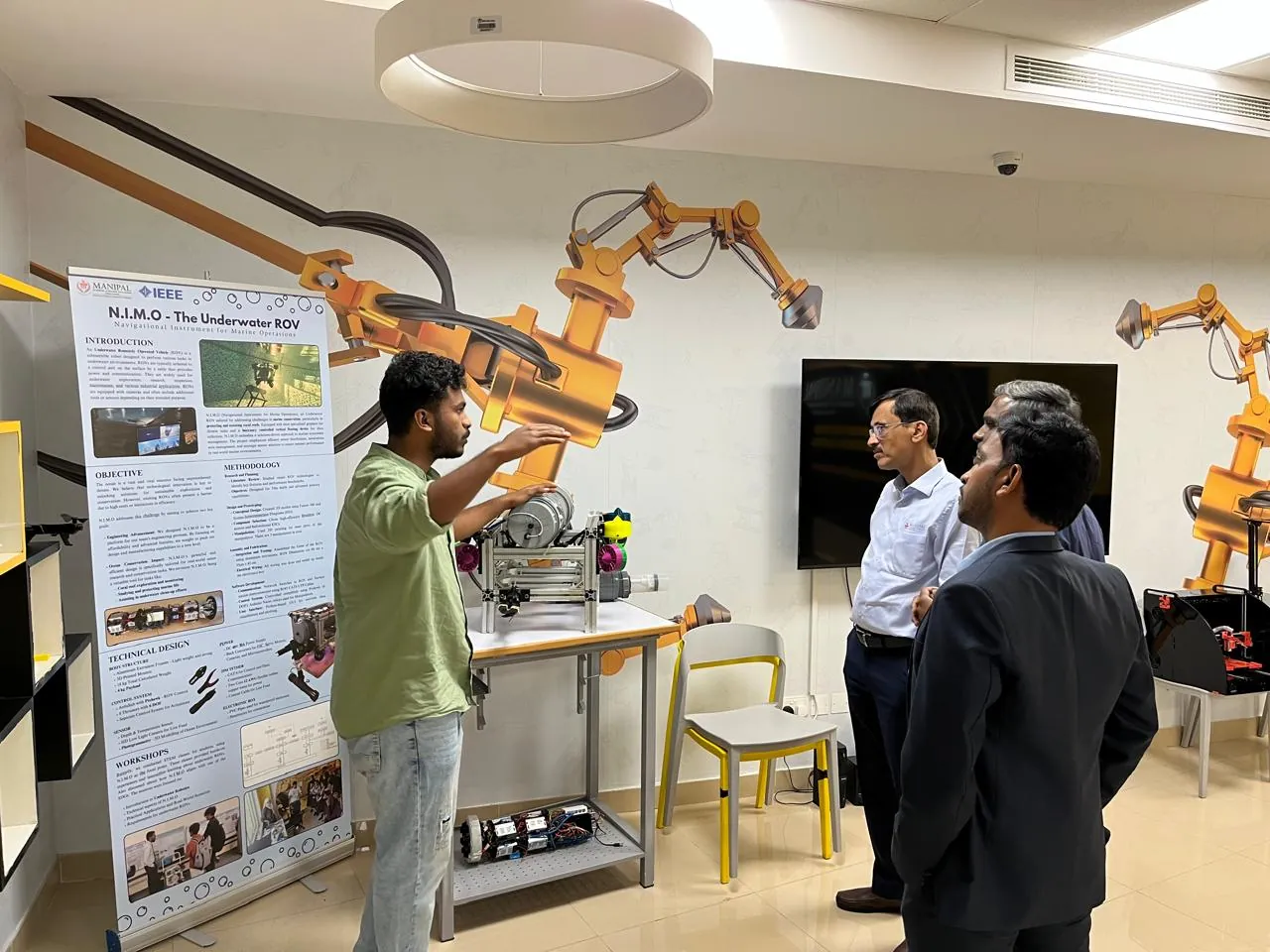 Presenting the ROV poster to faculty